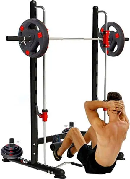 Man doing sit-ups on a home gym squat rack