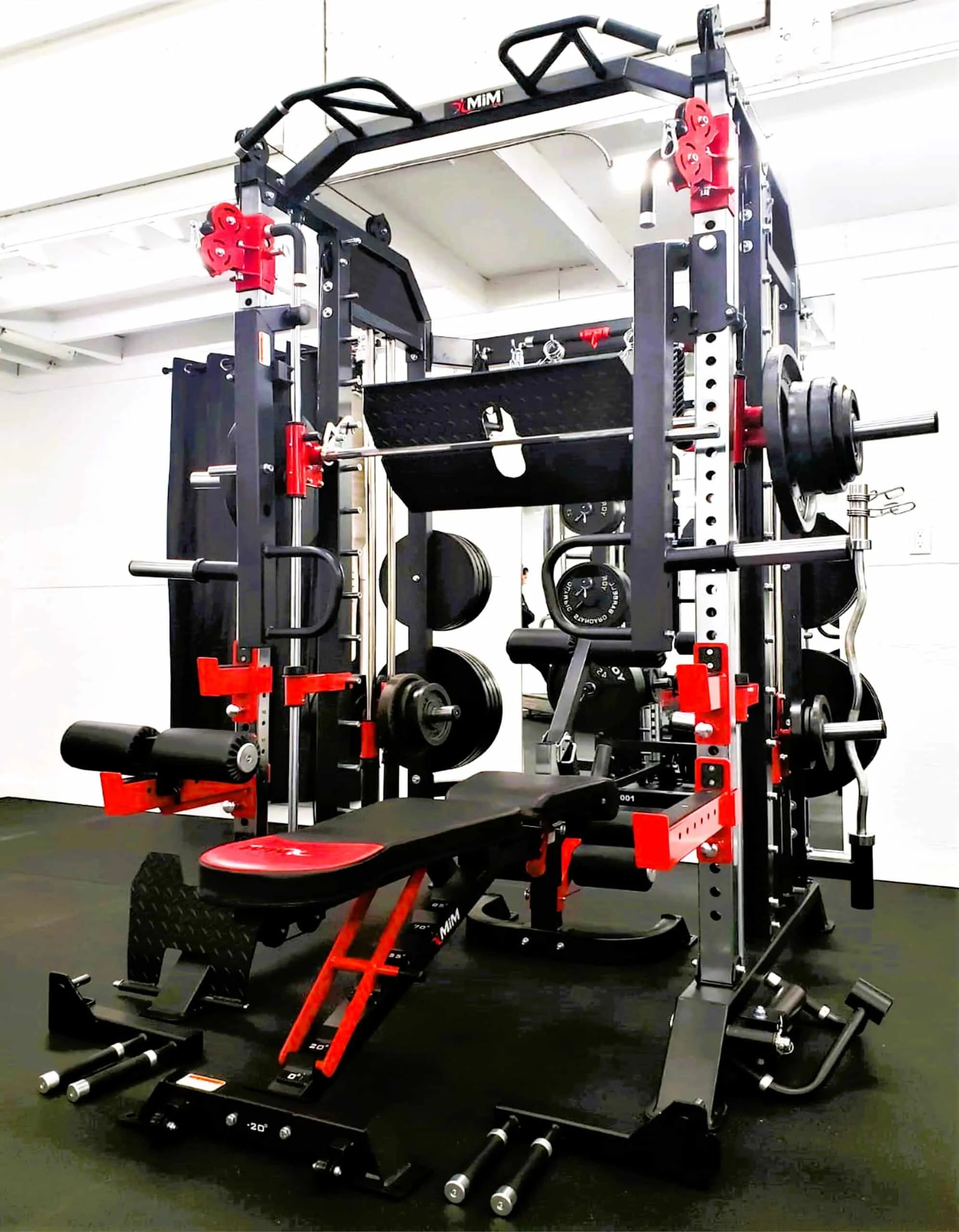 Modern multifunctional gym machine with weights and bench